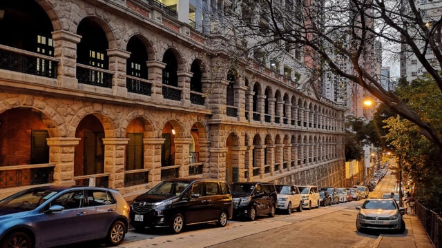 Facade of the Old Mental Hospital along High Street, one of the oldest surviving structures testifying the development of mental care services in Hong Kong, built in the style of monumental Early-Baroque architecture in Sai Ying Pun residential area, Western District, in the northwestern part of Hong Kong Island.